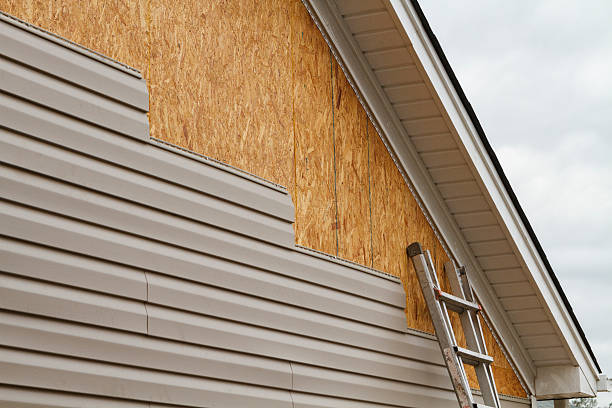 Professional Emergency Siding Repair technician working in Farmville, VA